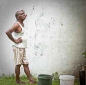 Richard Farnell - Fiji Man getting water