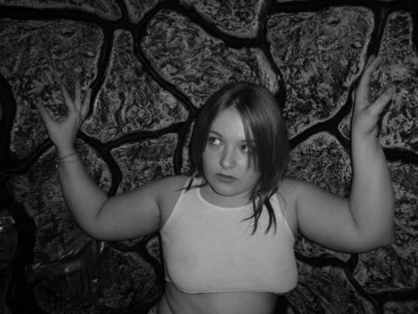 Malory Kelts - in the dungeon at work. black and white