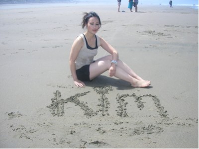 Kimberly - Relaxing on the beach sand