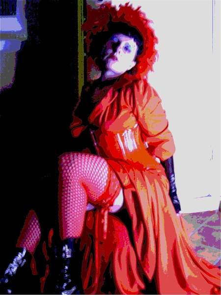 RubyFoo - feathers & a red corset & shiny boots....