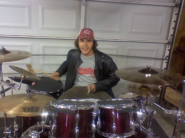 Lone Wolf - Andy plays drums with his brother's band member