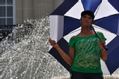 Sherrisse Johnson - Umbrella in the fountain